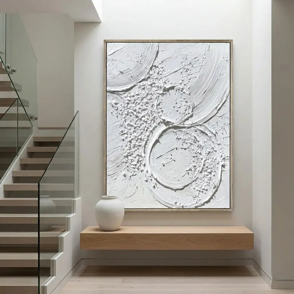 Modern interior with abstract wall art and wooden console table.