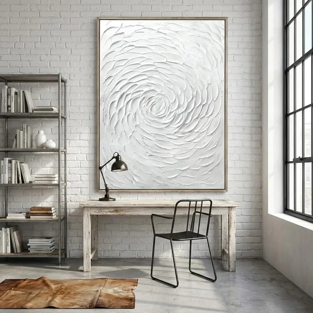 Modern home office with a large abstract painting on the wall, desk, and bookshelf.