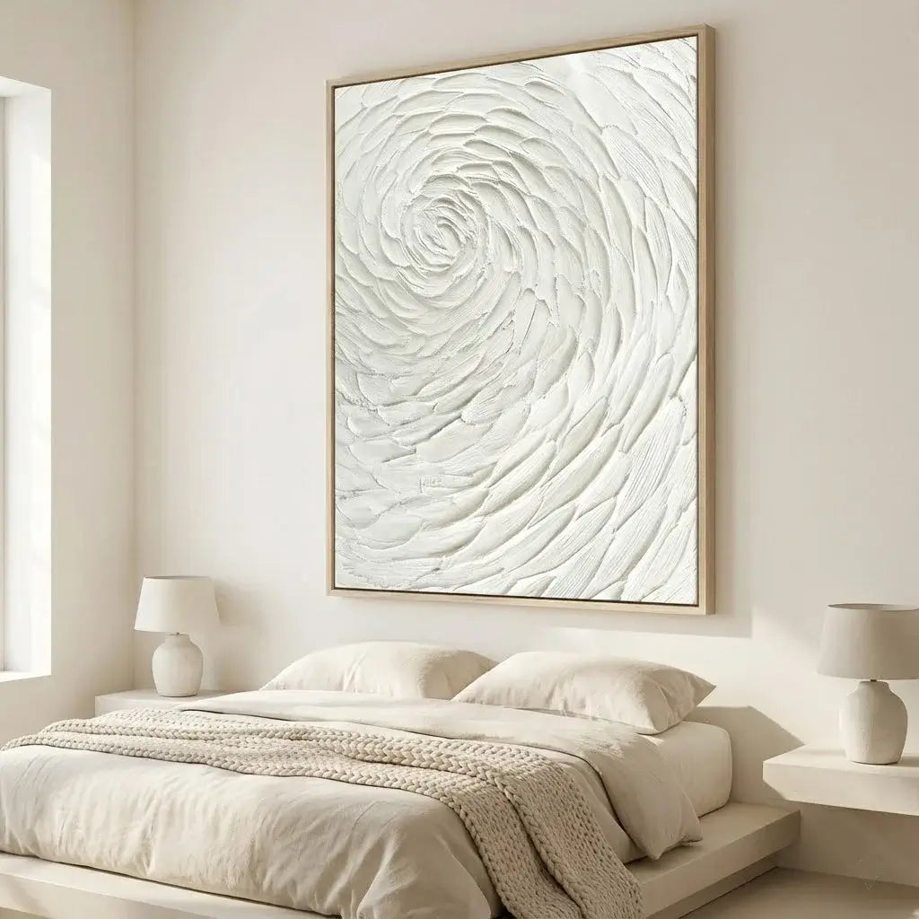 Beige abstract wall art above a bed in a bedroom setting