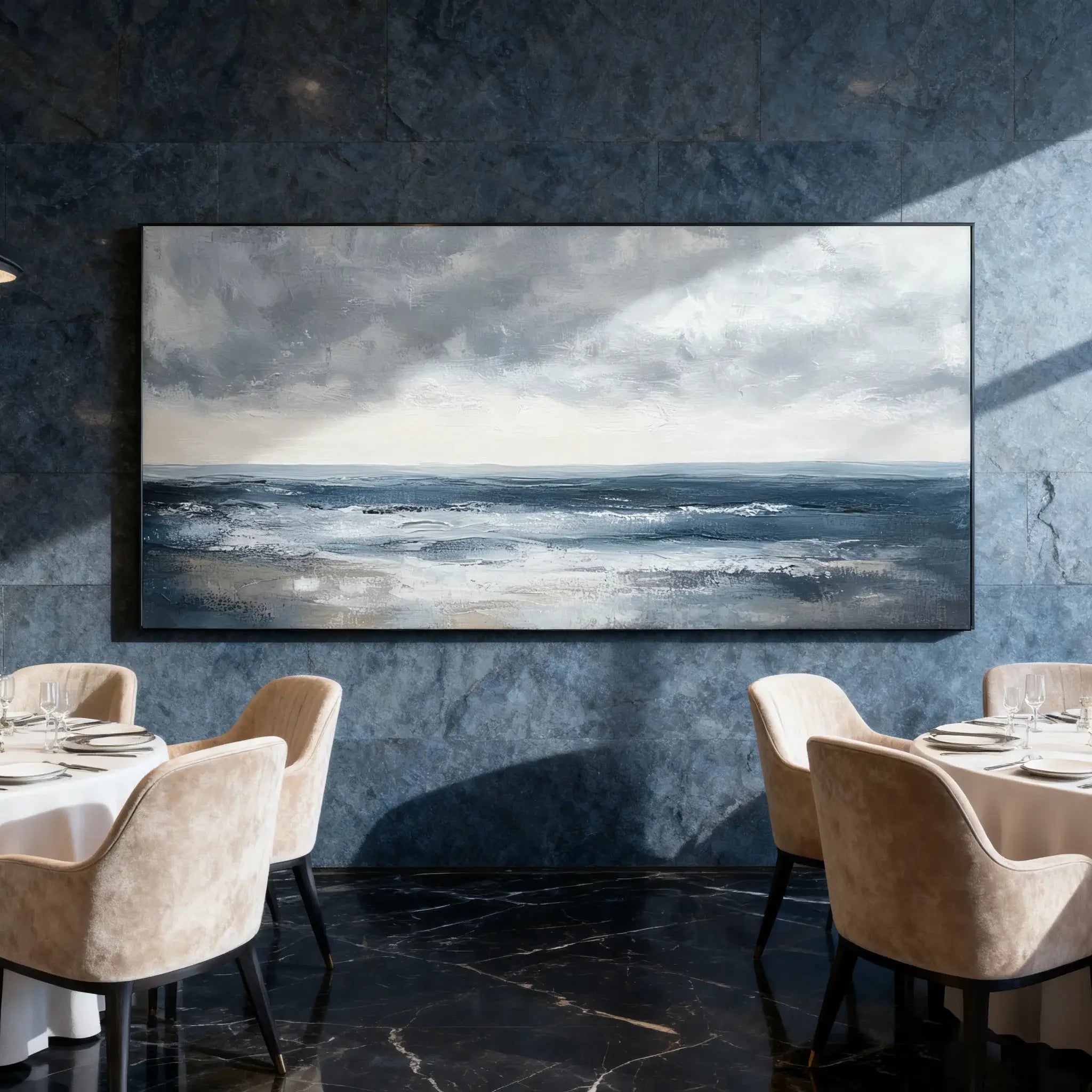 Dining room with a large abstract painting of a seascape on a textured wall.