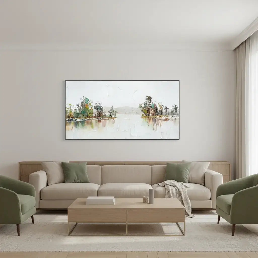 Modern living room with a beige sofa, green armchairs, and a wall-mounted painting.
