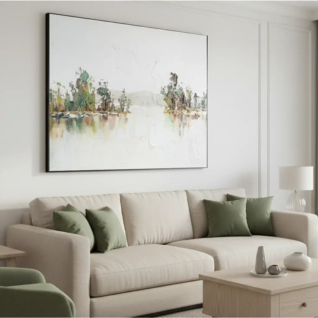 Living room with a beige sofa, green pillows, and a large abstract painting on the wall.