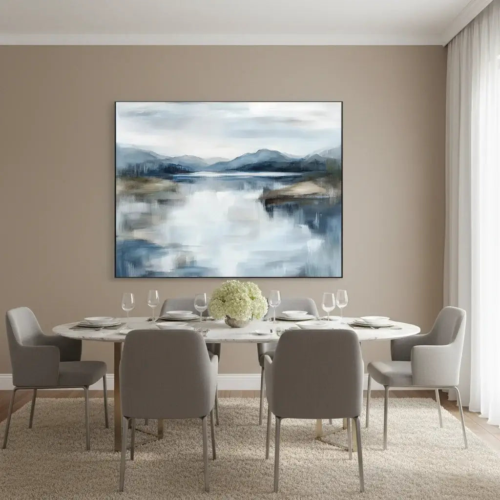 Dining room with a round table and chairs, and a large abstract painting on the wall.