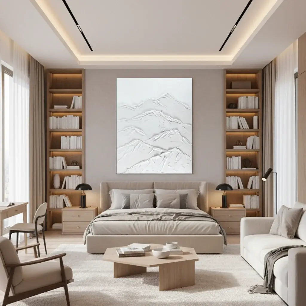 Modern bedroom with bookshelves, bed, and artwork on a gray wall.