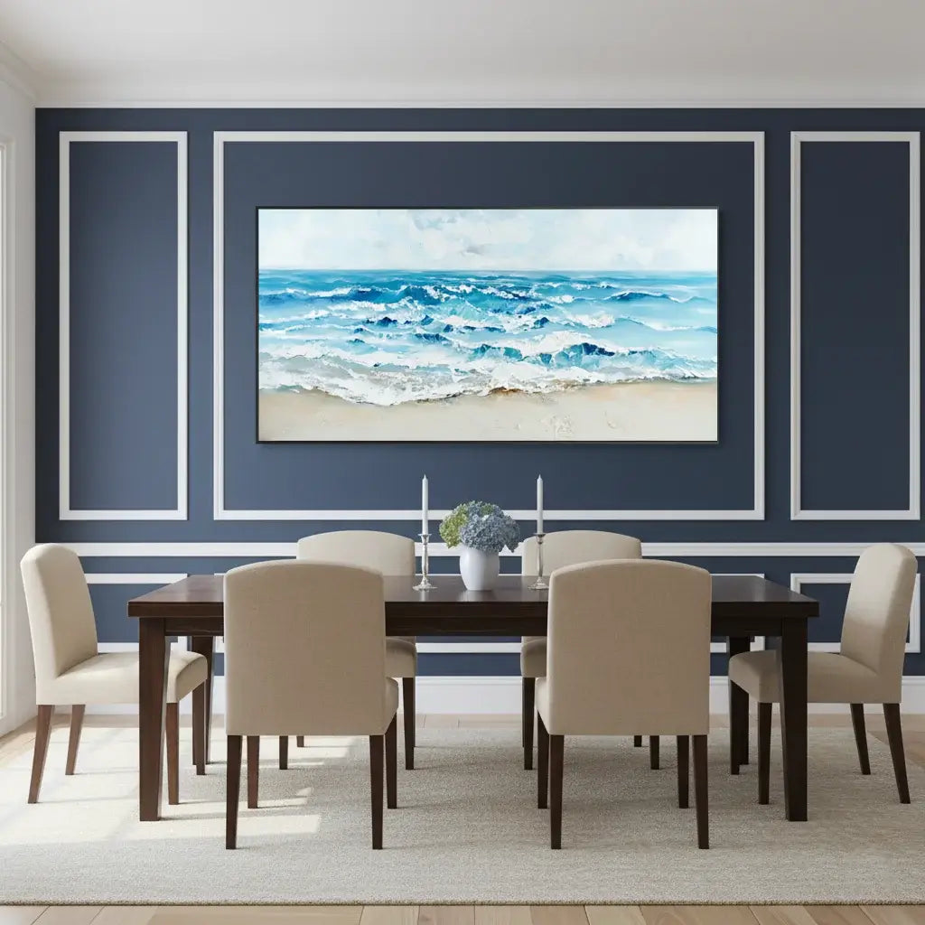 Dining room with a large framed beach scene on the wall