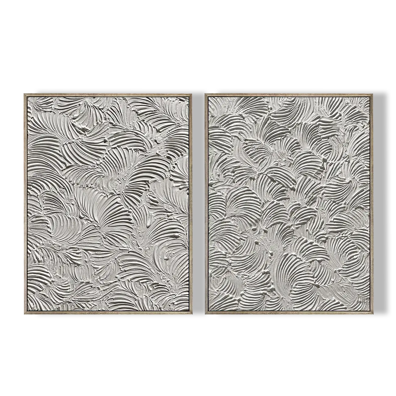 Two decorative wall panels with a leaf pattern on a white background