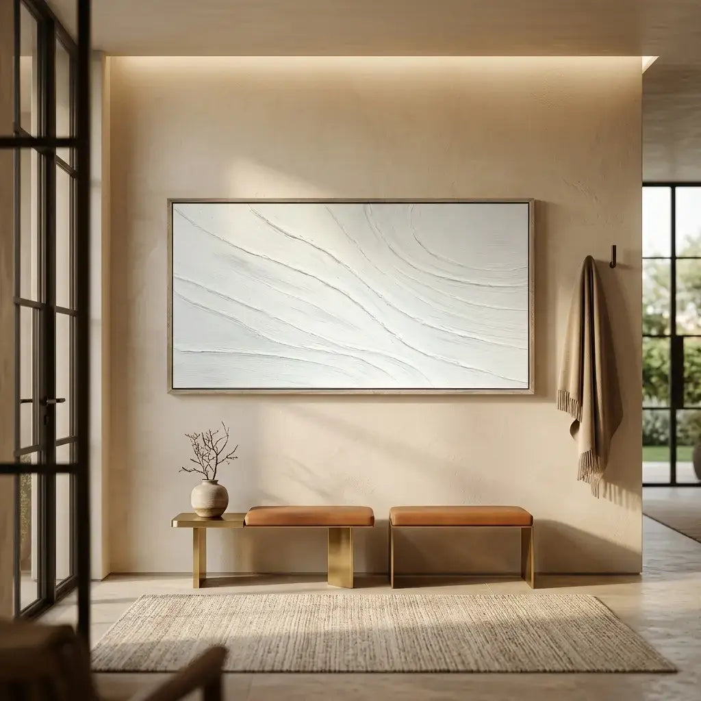 Modern interior with abstract wall art, leather bench, and rug.