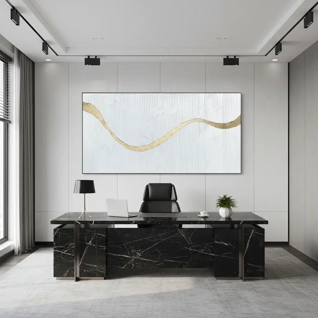 Modern office setup with a black marble desk, chair, and decor elements.