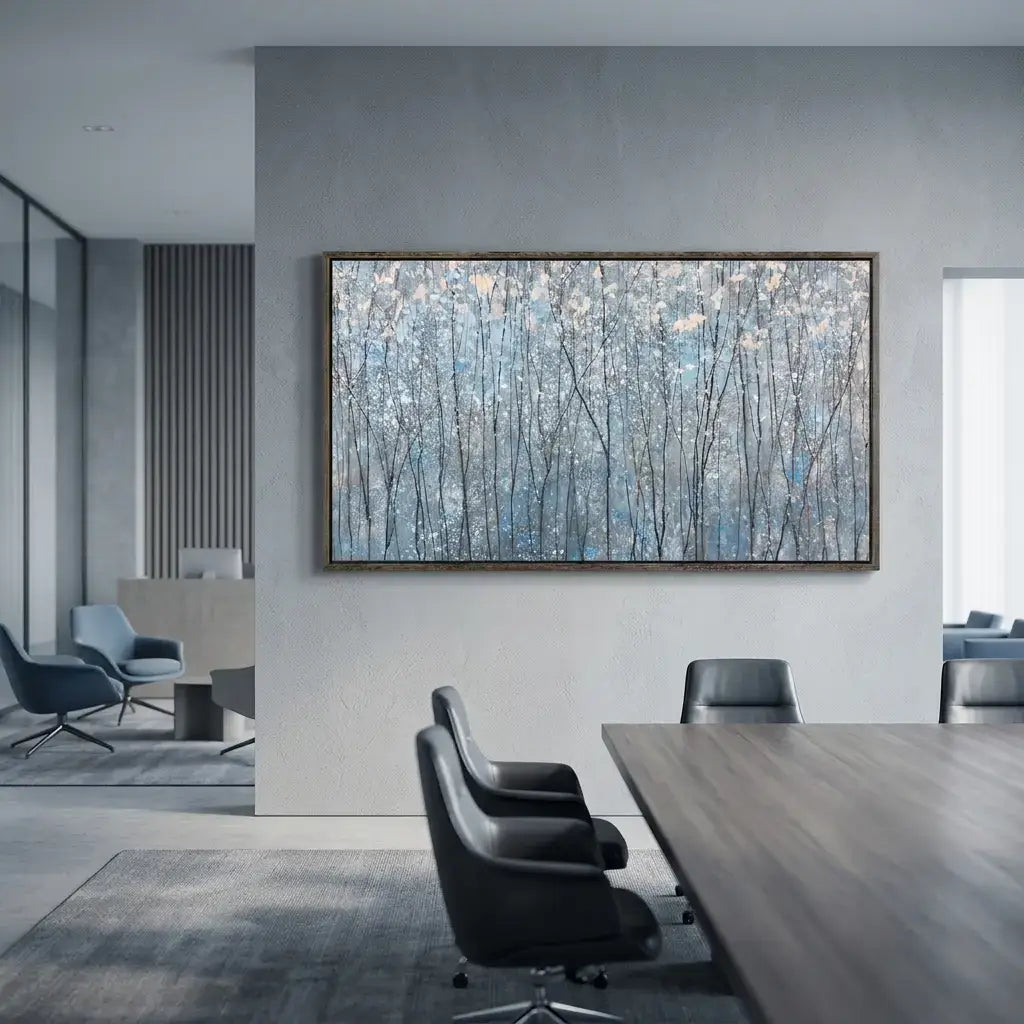 Modern office interior with a large abstract painting on the wall.