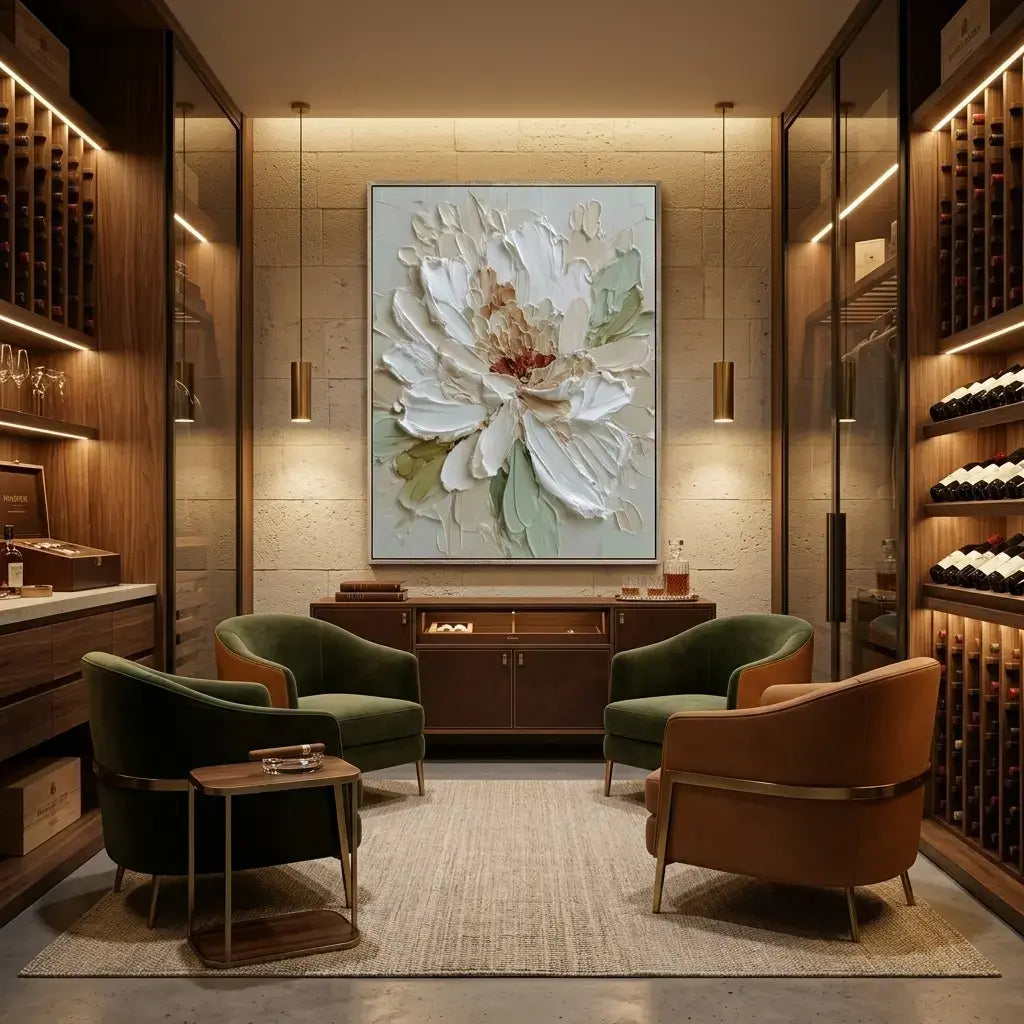 Luxury wine cellar with green chairs, a table, and a large floral painting on the wall.