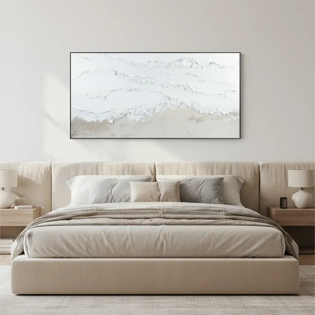 Beige bedroom with a large abstract painting on the wall