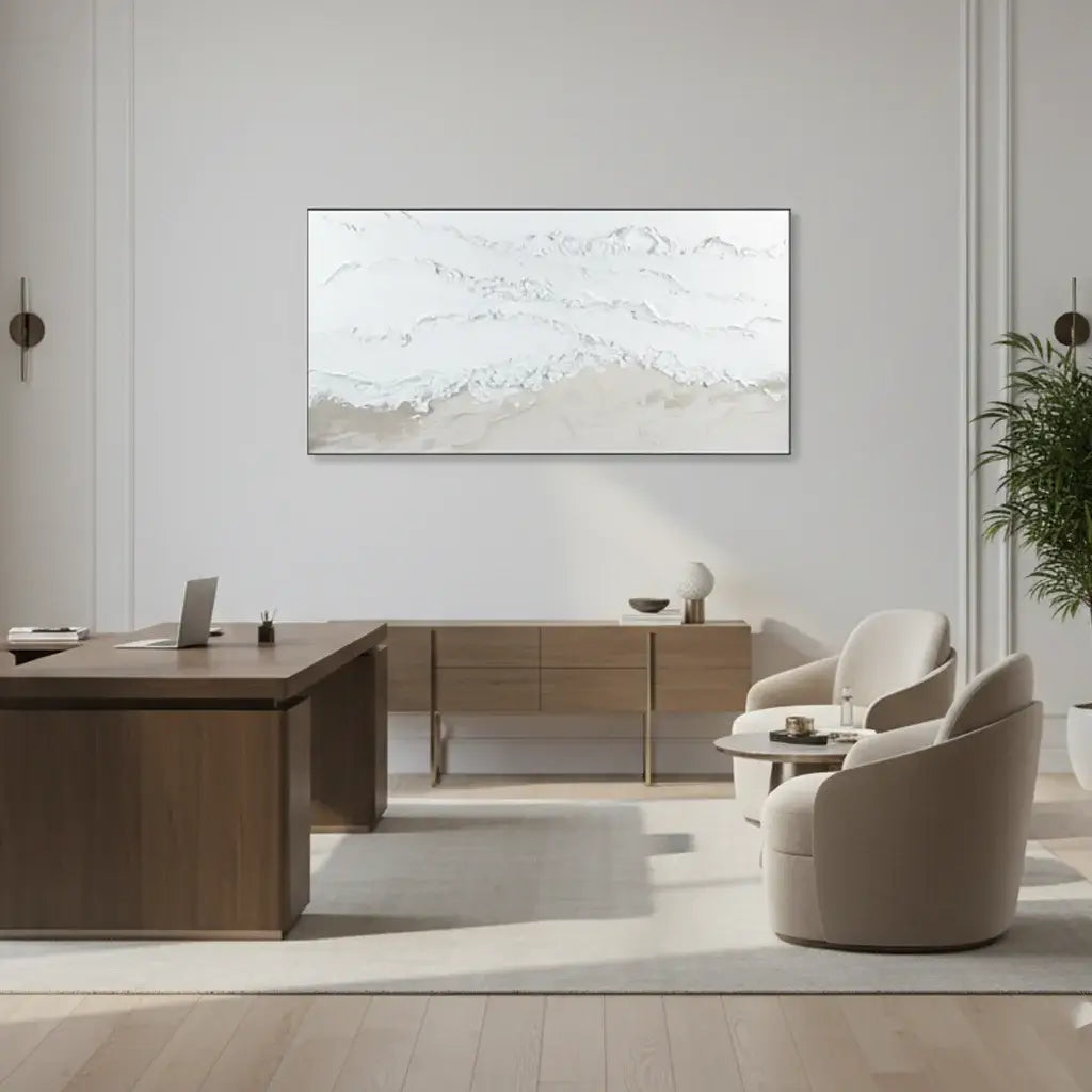 Modern office interior with a large abstract painting on the wall, wooden desk, and beige chairs.