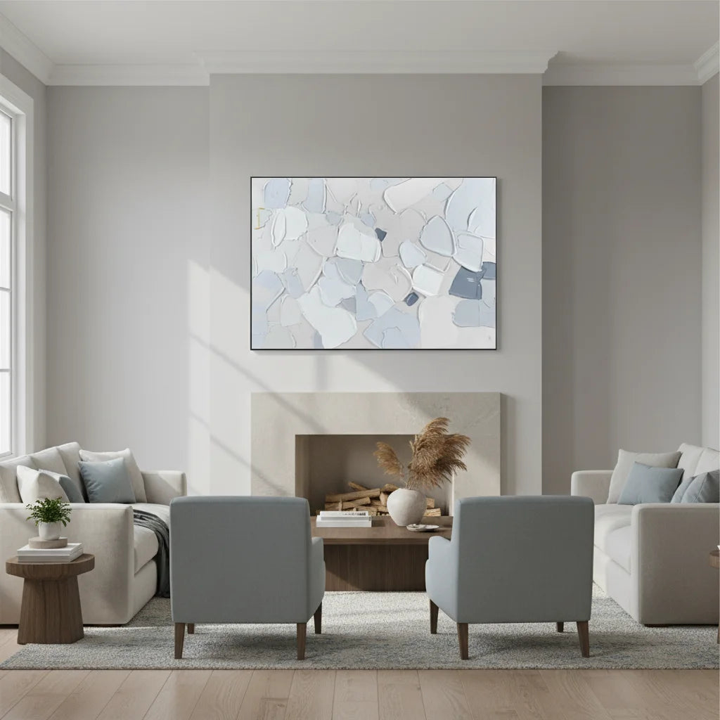 Modern living room with gray sofas, chairs, and a fireplace.