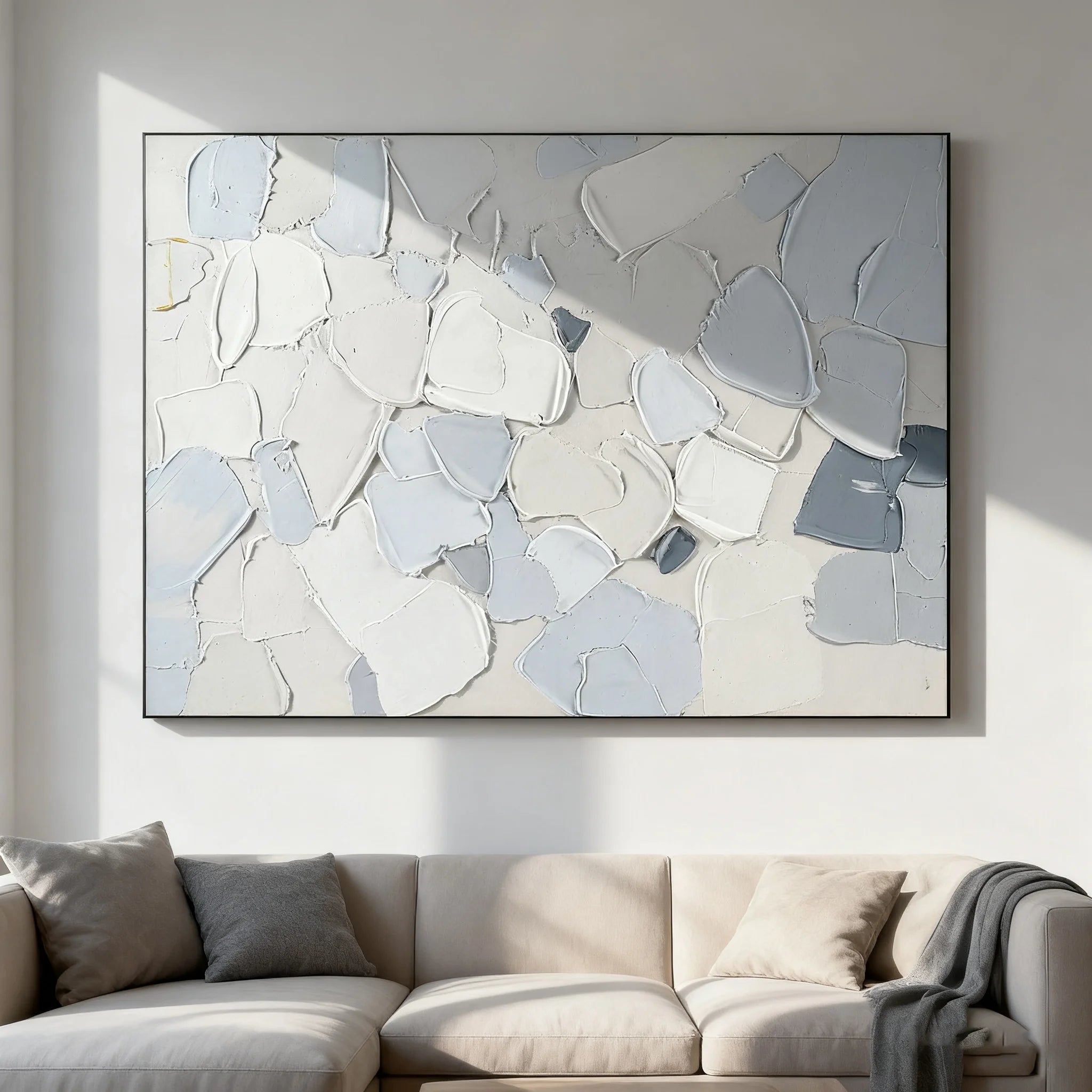Abstract art piece in a modern living room setting