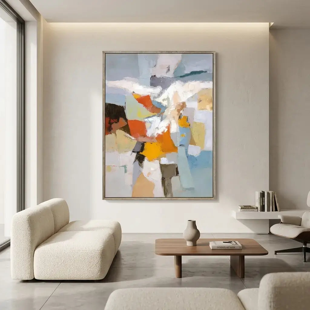 Modern living room with a colorful abstract painting on the wall.