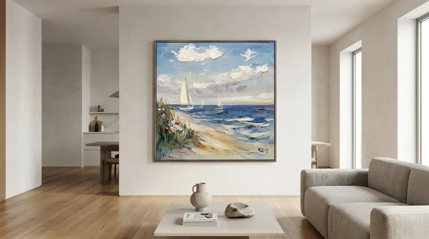 Living room with a large painting of a beach scene on the wall.