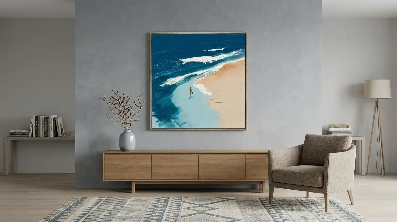 Modern living room with a beach-themed painting on the wall