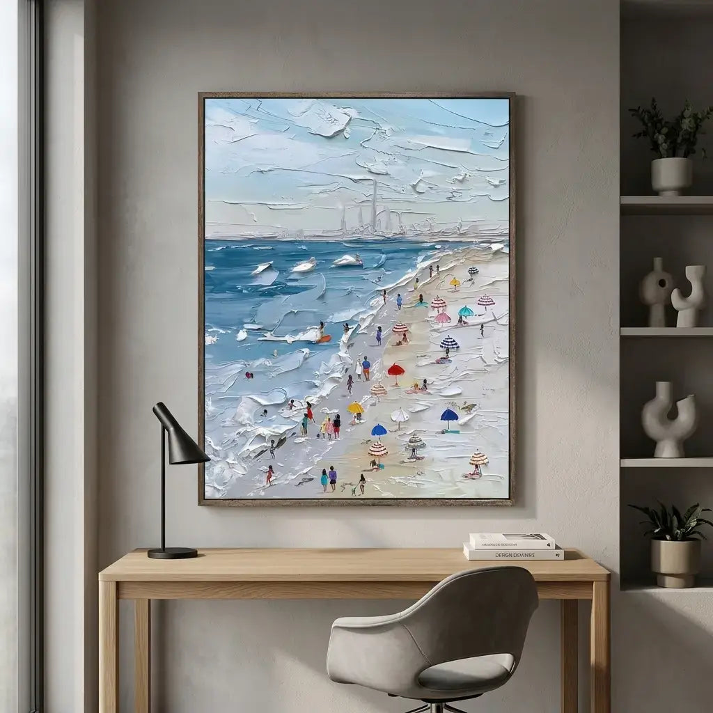 Framed beach painting above a desk in a home office setting