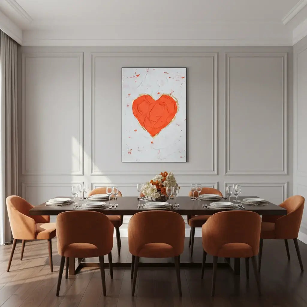 Dining room with a heart-shaped painting on the wall and a set table.