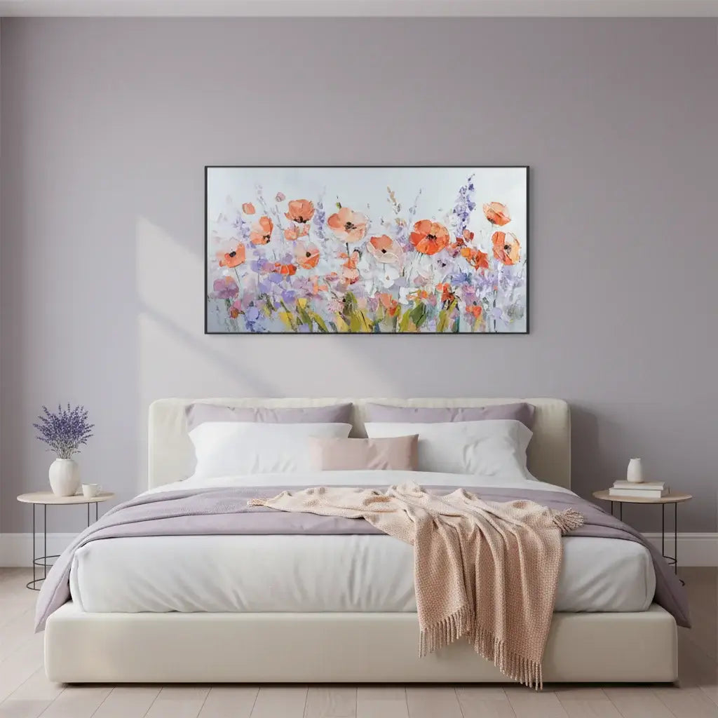 Bedroom with floral artwork on the wall above a bed