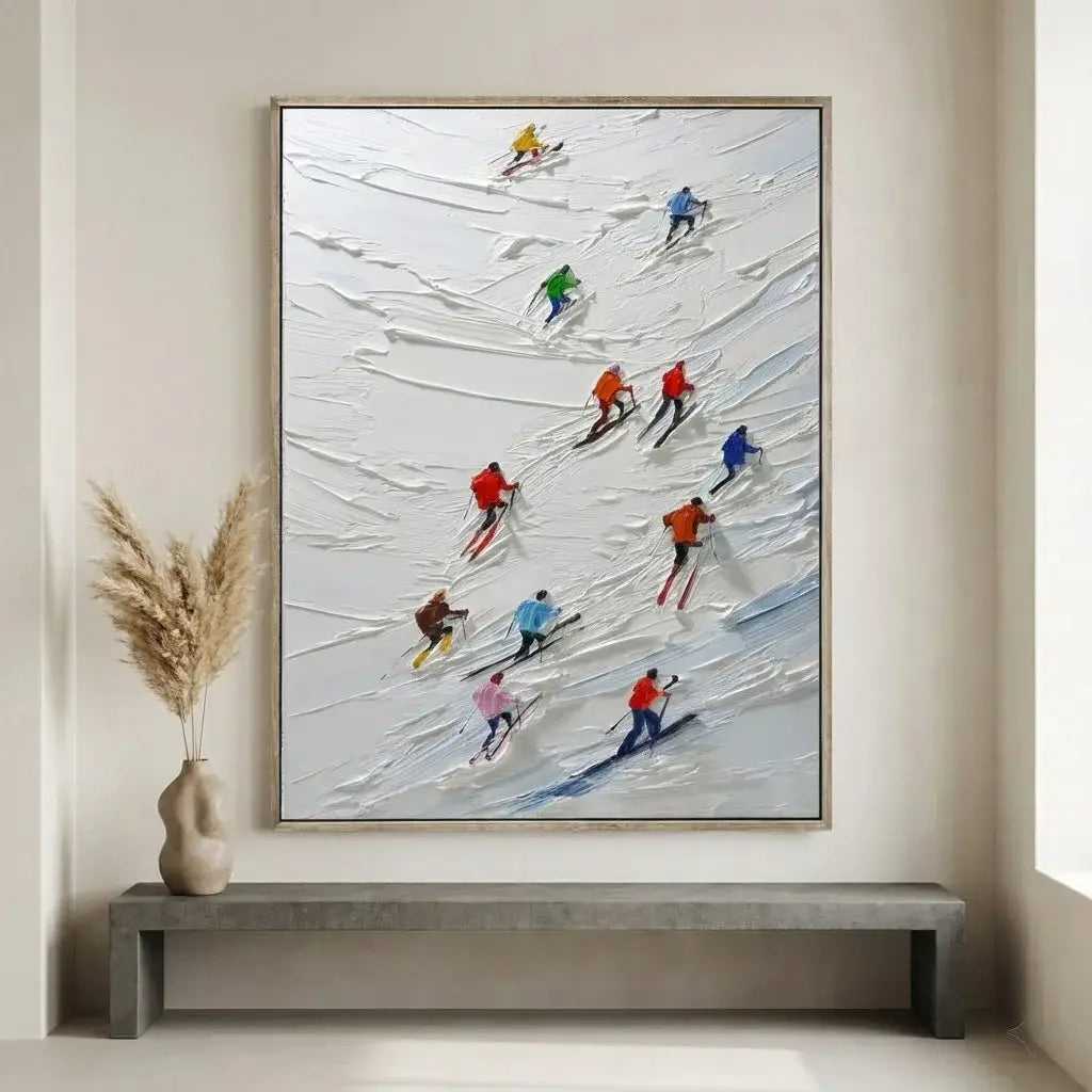 Framed artwork of skiers on a snowy slope in a modern interior setting.