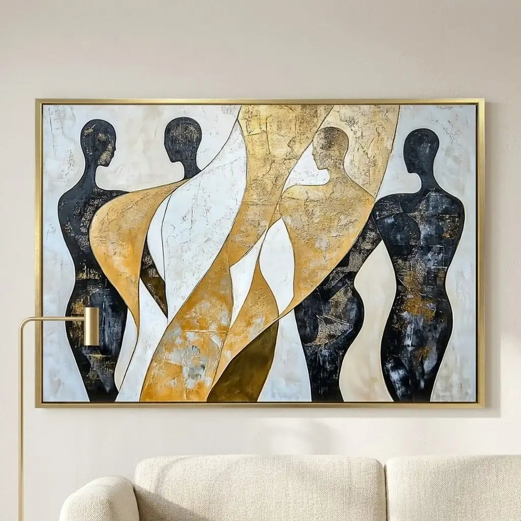 Abstract art piece on a wall above a desk with a lamp and bookshelf in the background.