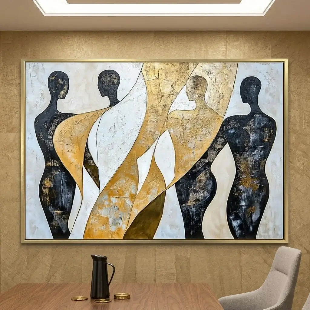 Modern bedroom with abstract art on the wall, black dresser, and bed with white and gold bedding.