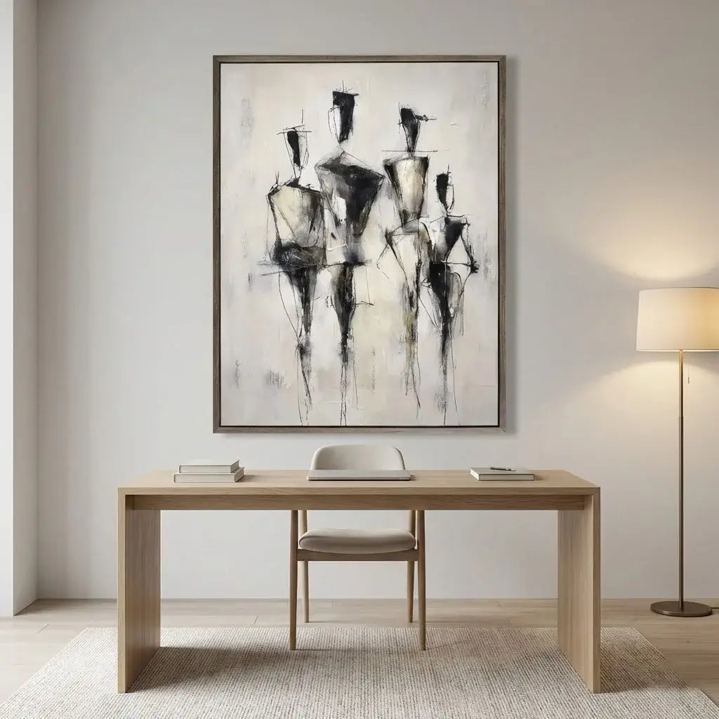 Abstract art piece on a wall above a wooden desk in a modern room.