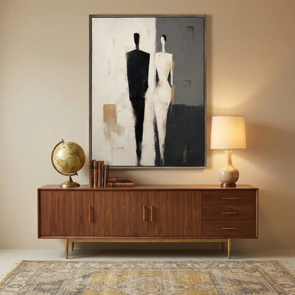 Wooden sideboard with decorative items and a large abstract painting on the wall.