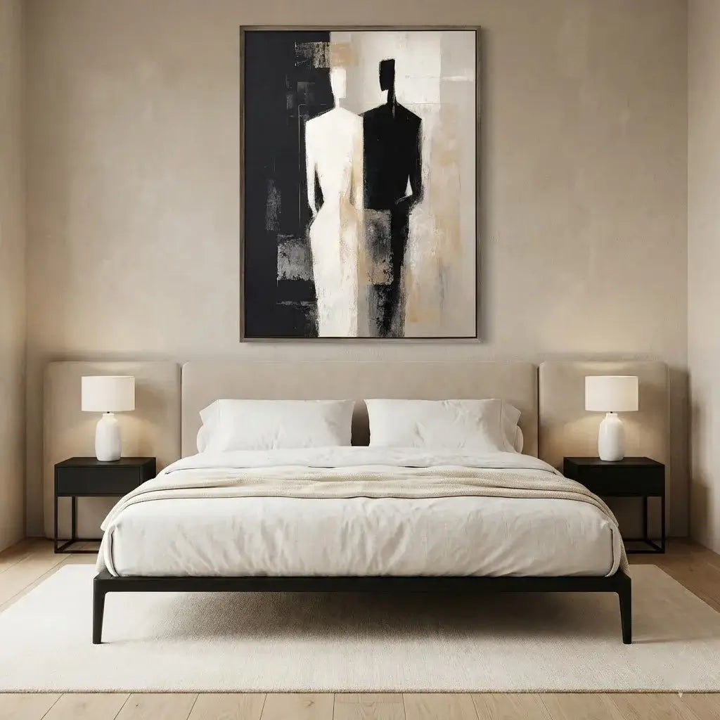 Modern bedroom with a bed, nightstands, and abstract art on the wall.