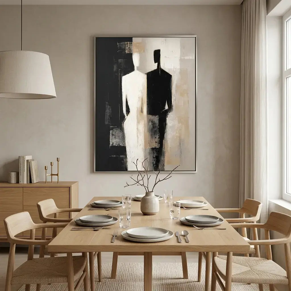 Dining room with a wooden table set for four, abstract art on the wall, and natural light.