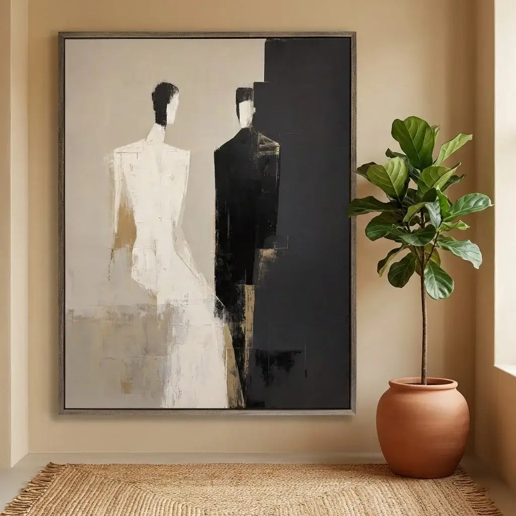 Abstract art piece on a wall with a potted plant below