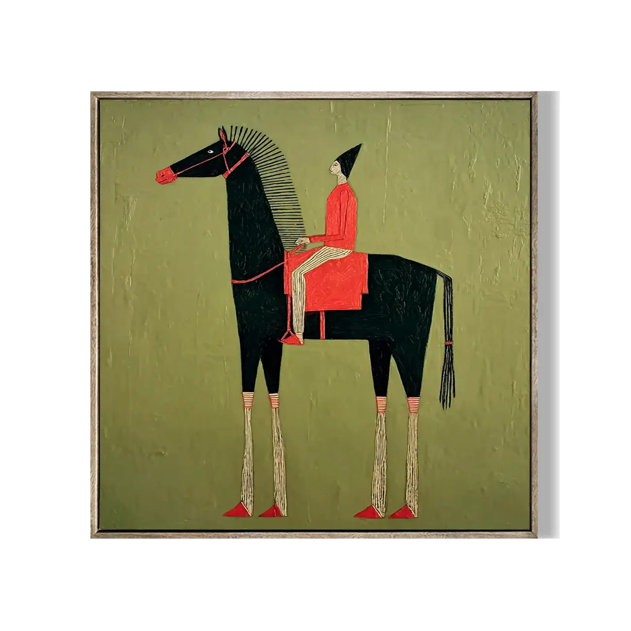 Framed artwork of a horse and rider on a green background