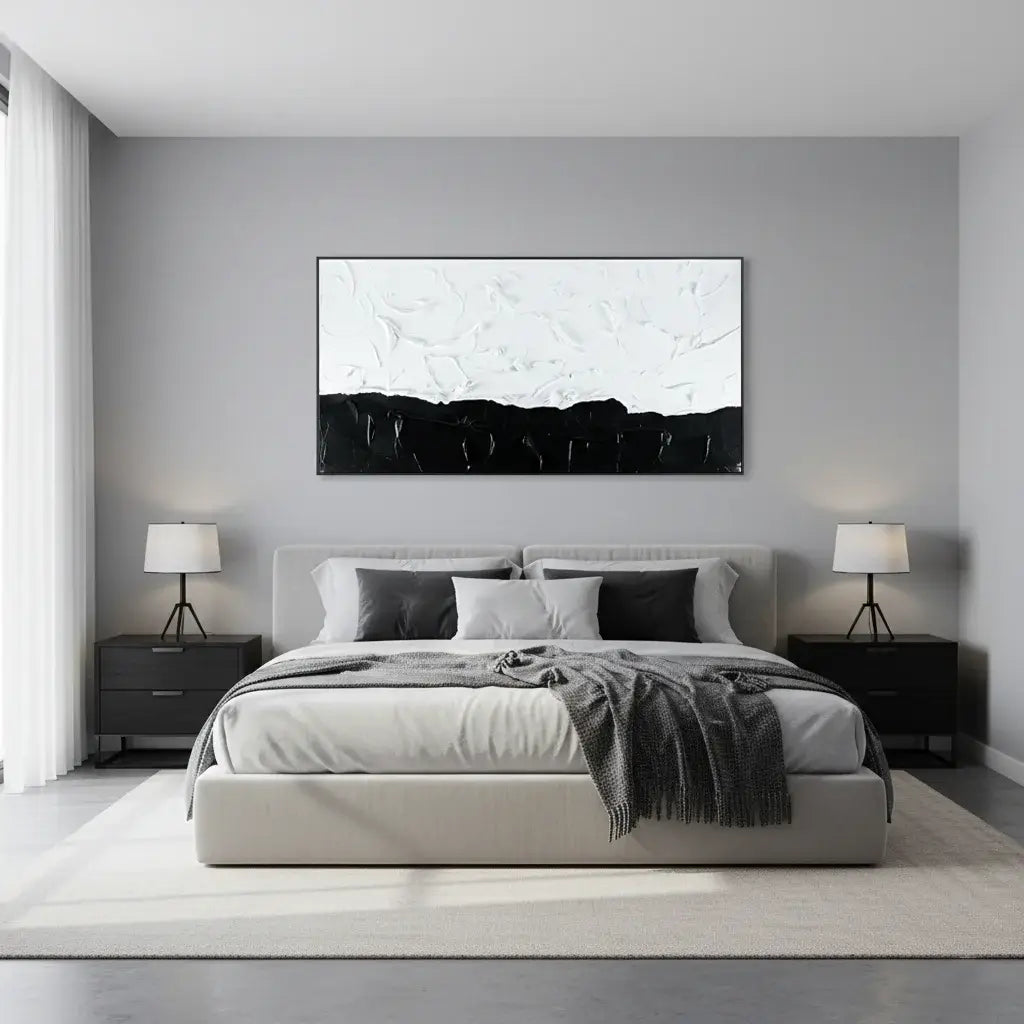 Modern bedroom with a bed, nightstands, and abstract wall art.
