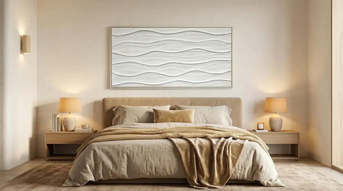Modern bedroom with a bed, nightstands, and wall art.