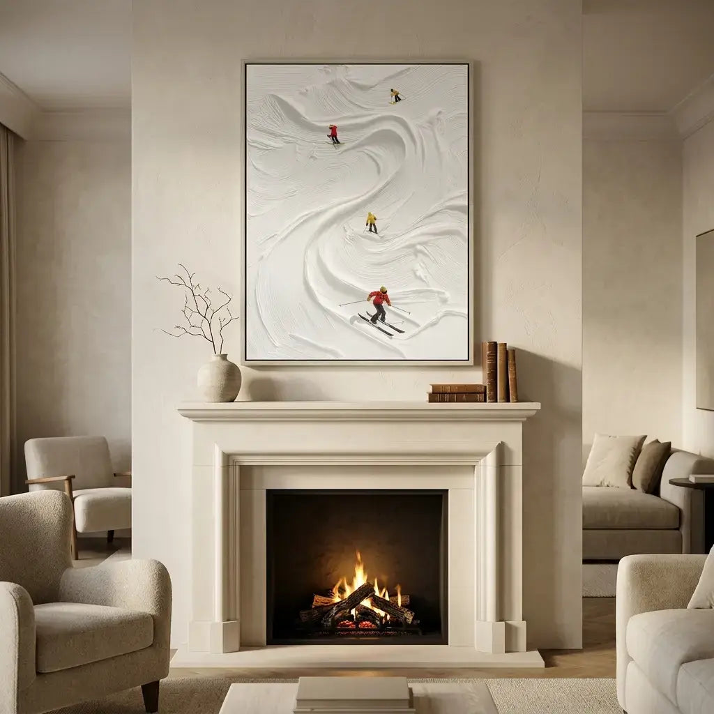 Living room with a fireplace, books, and a framed picture of skiers.