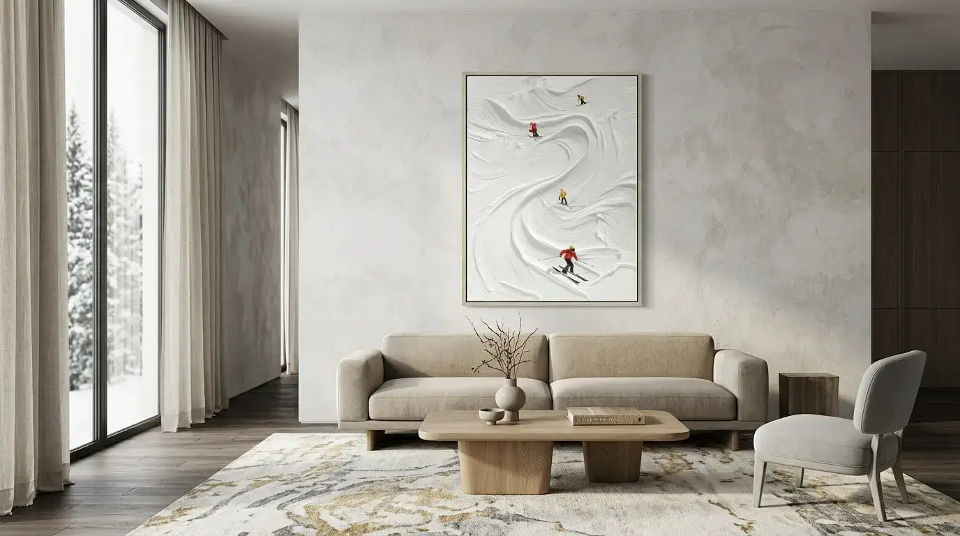 Modern living room with a beige sofa, coffee table, and decorative wall art.