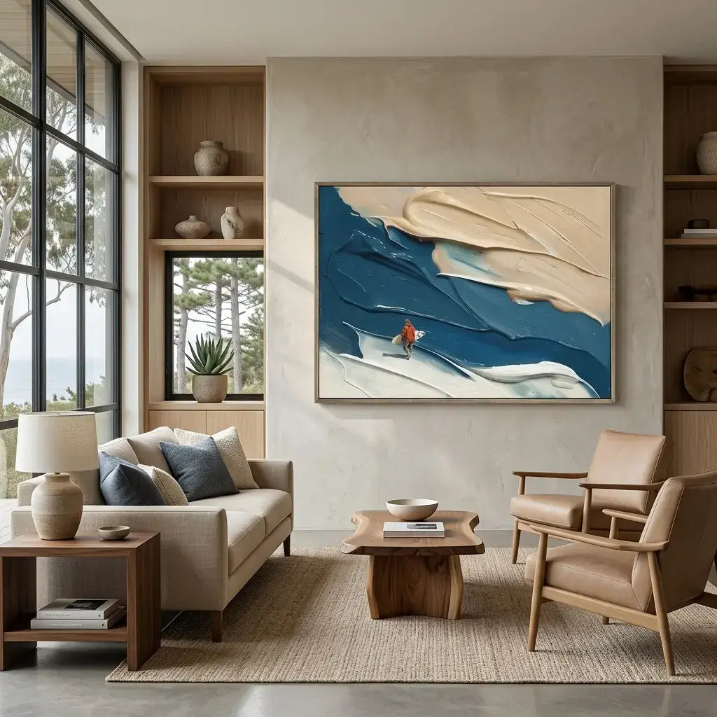 Modern living room with a sofa, chairs, coffee table, and abstract painting on the wall.