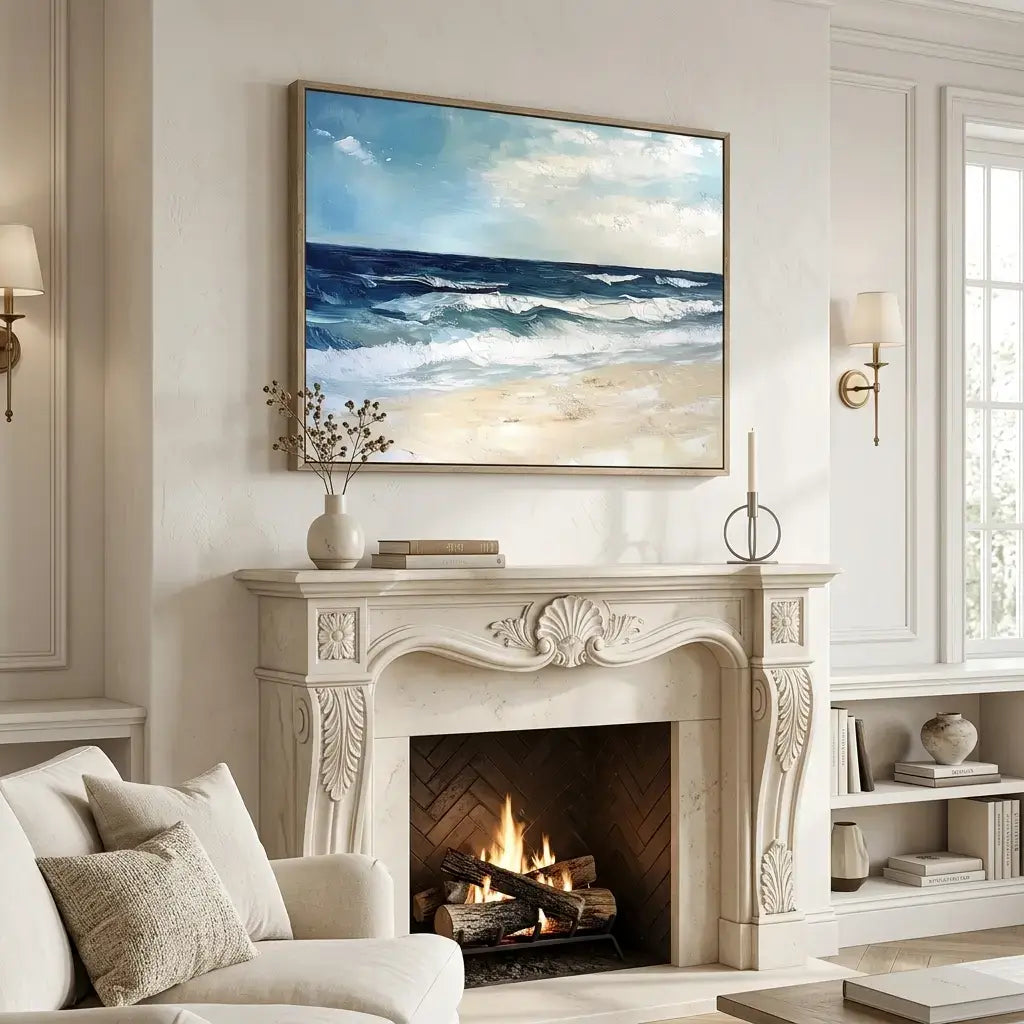 Living room with a fireplace, sofa, and wall art of a beach scene.