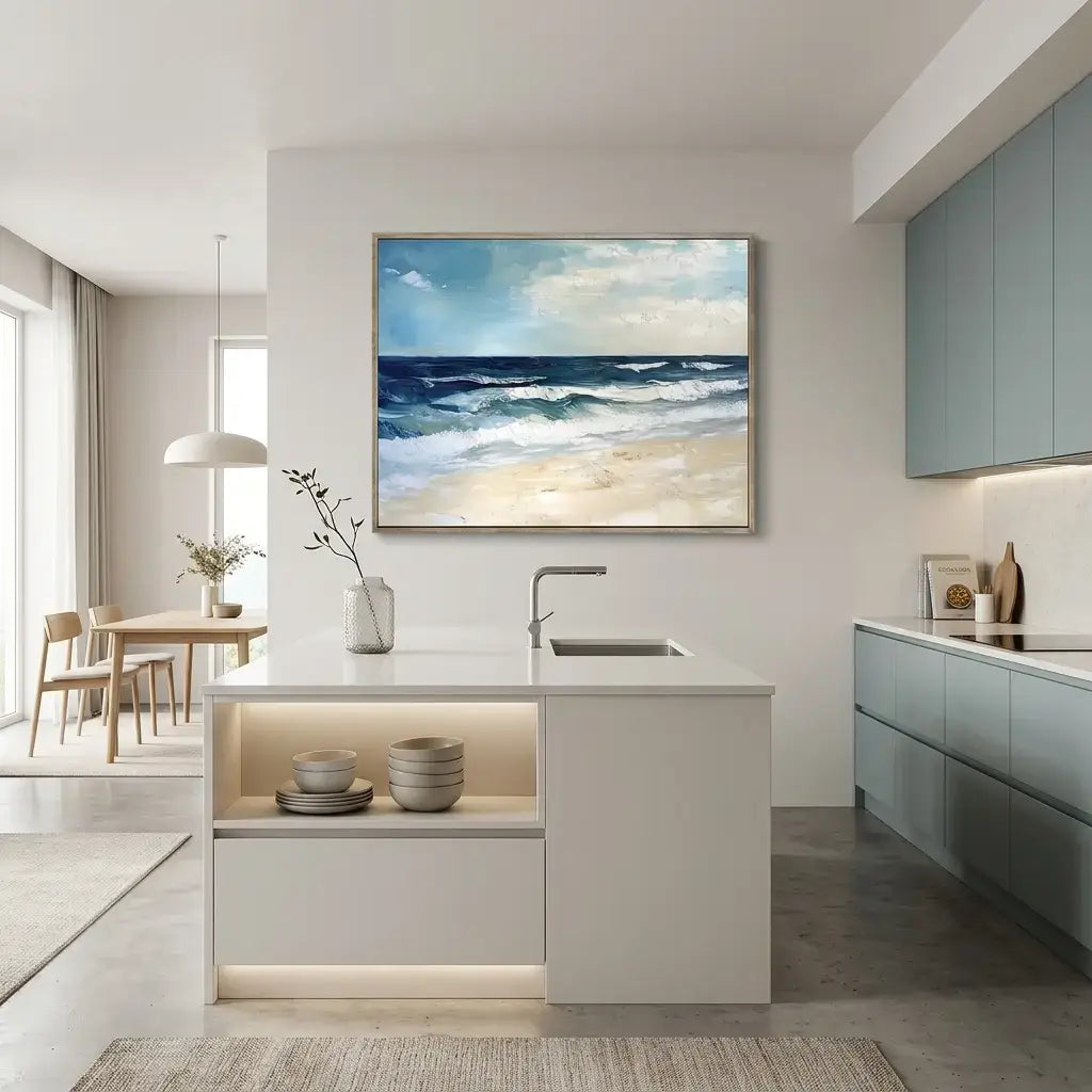 Modern kitchen with a painting of a beach scene on the wall