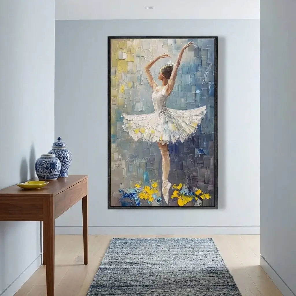 Framed artwork of a ballerina in a room with a wooden table and decorative vases.