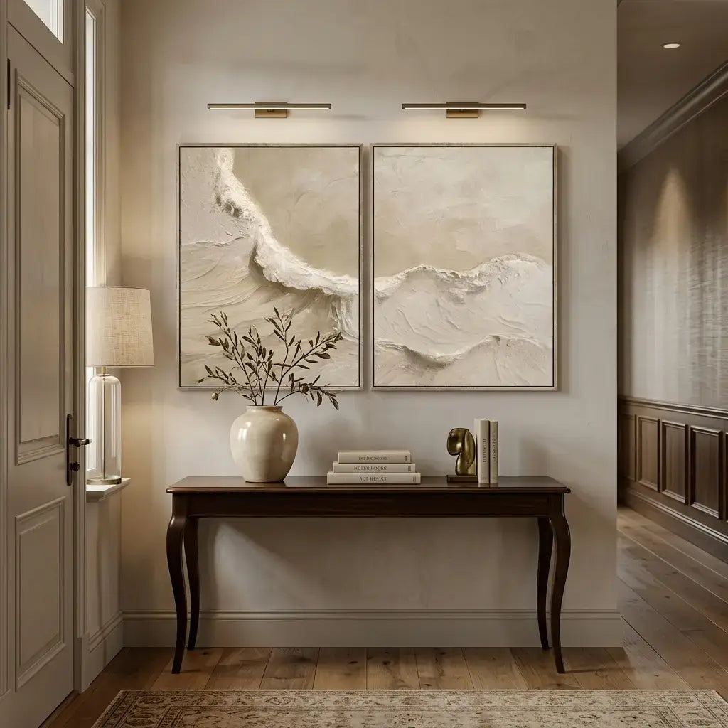 Modern interior with wall art, vase, and decor items on a console table.