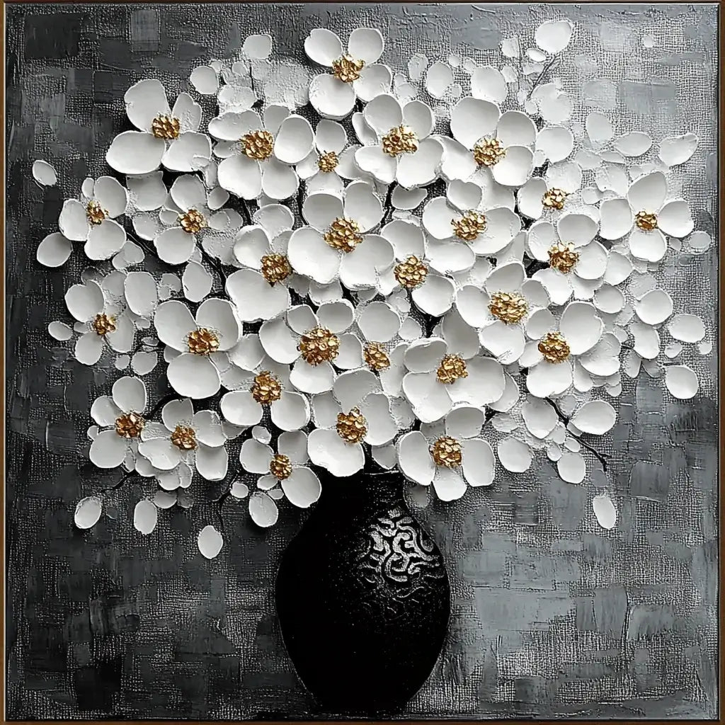Decorative wall art with white flowers and a black vase on a textured gray background