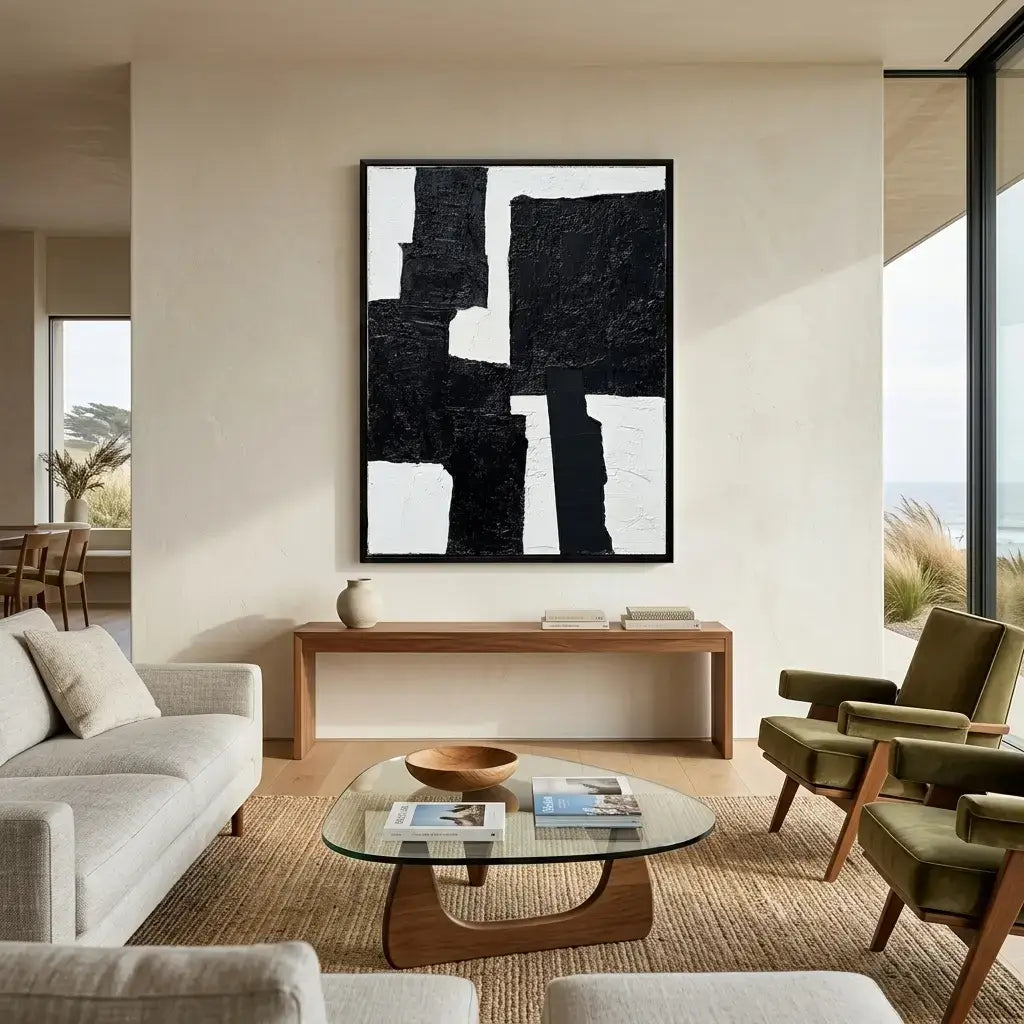 Modern living room with abstract art, furniture, and decor.