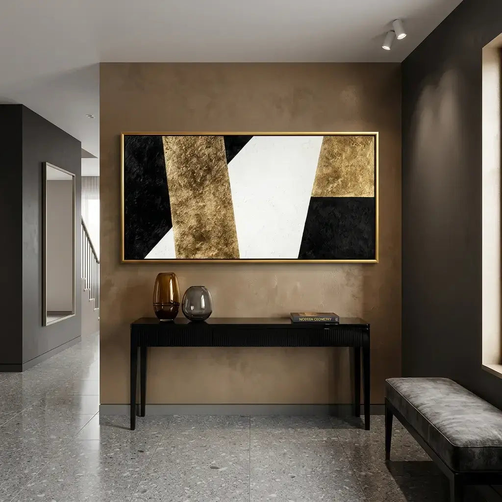 Modern interior with abstract art, console table, and bench.