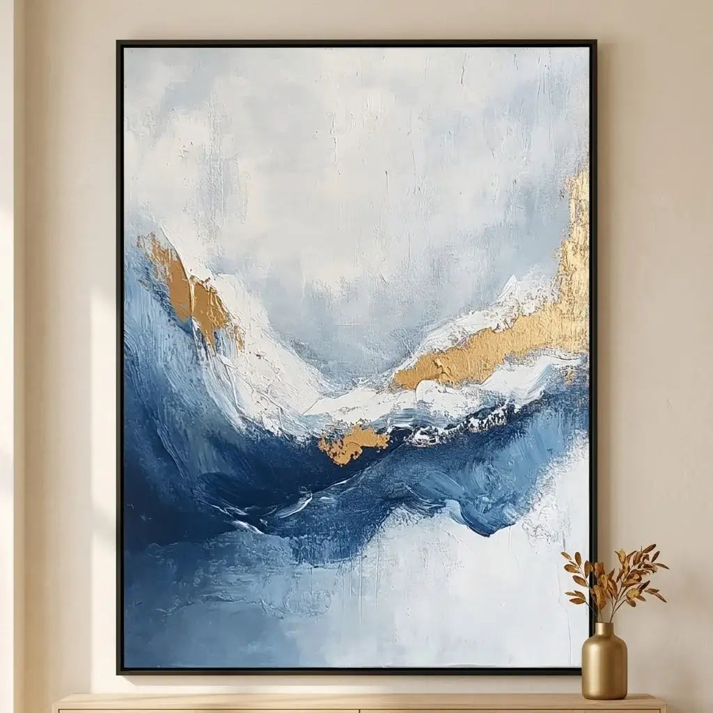 Abstract painting with blue and gold tones in a living room setting.