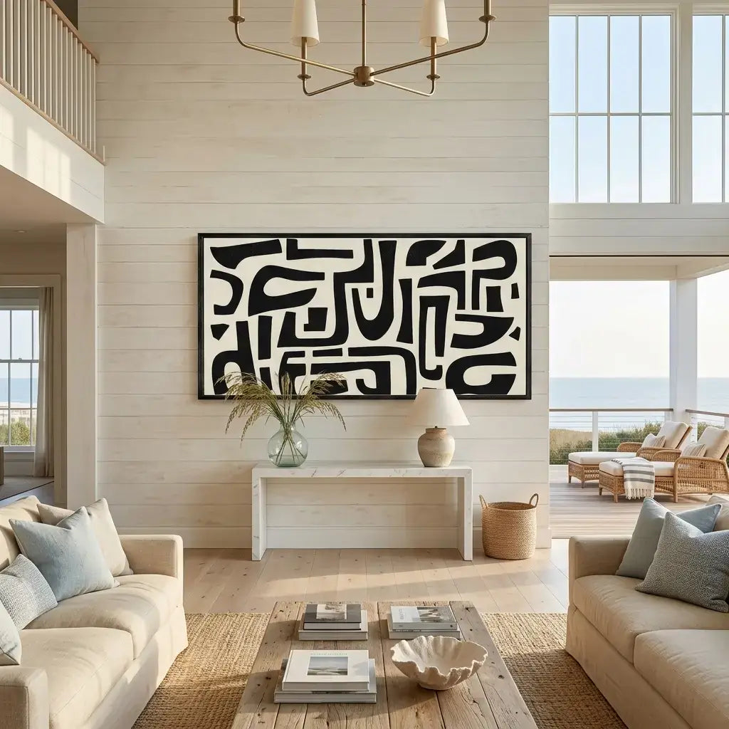 Modern living room with abstract art, beige sofas, and a chandelier.