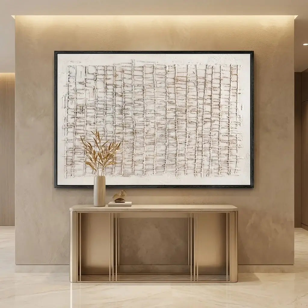 Framed musical sheet art on a wall above a console table with decor items.