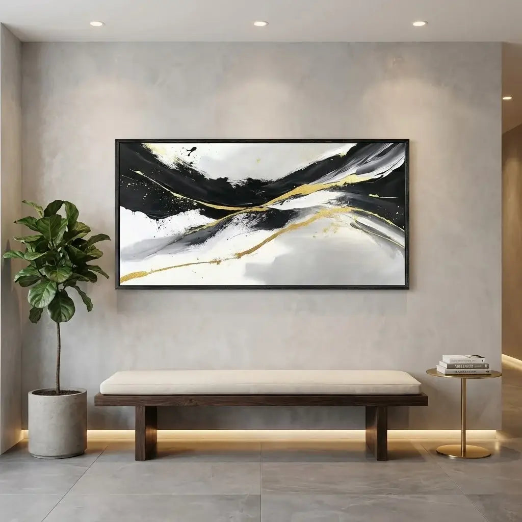 Modern interior with abstract art on the wall, bench, and plant.