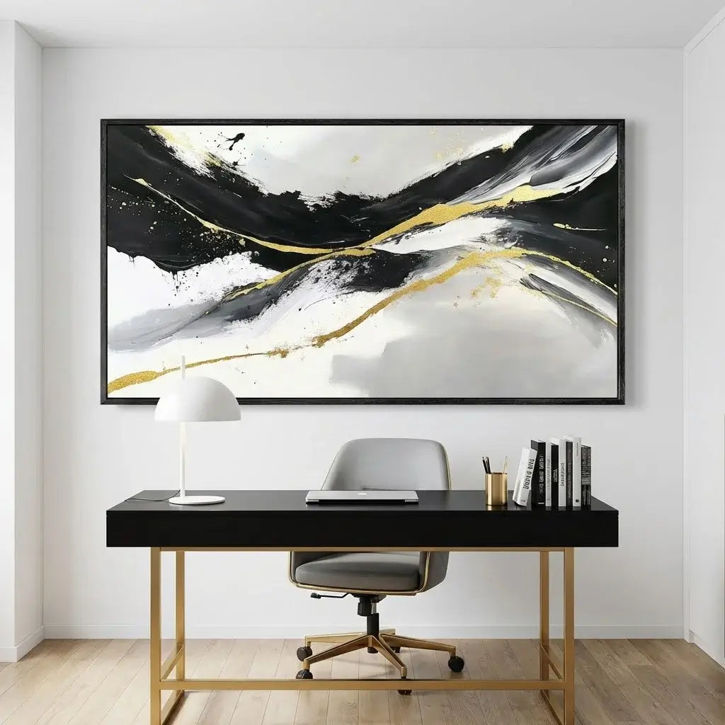 Modern office setup with a black desk, gray chair, and abstract painting on the wall.